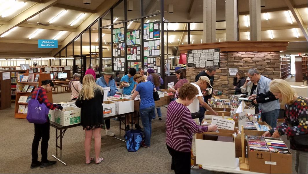 Patrons shopping at Used Book Sale